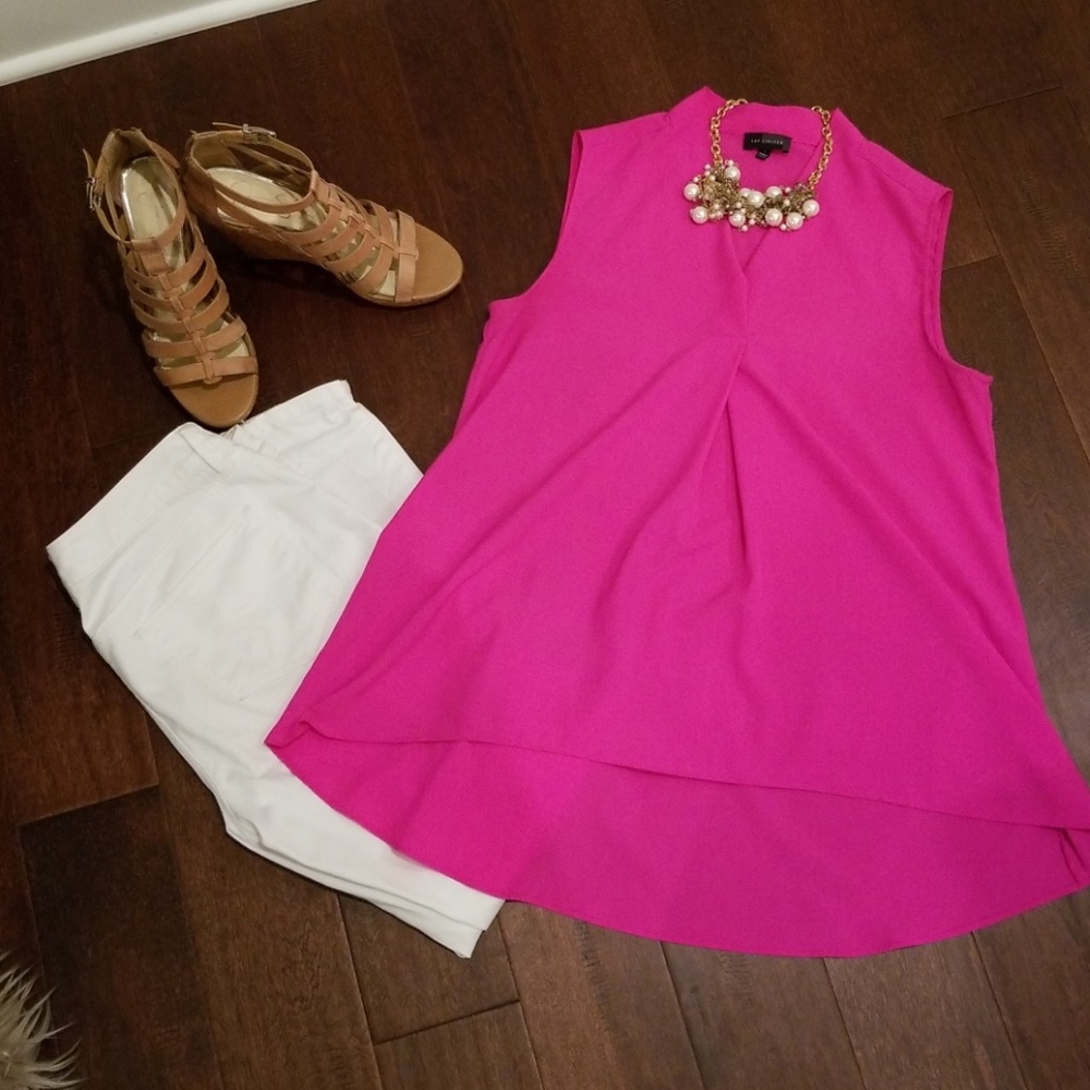 Bright pink sleeveless hi-low top